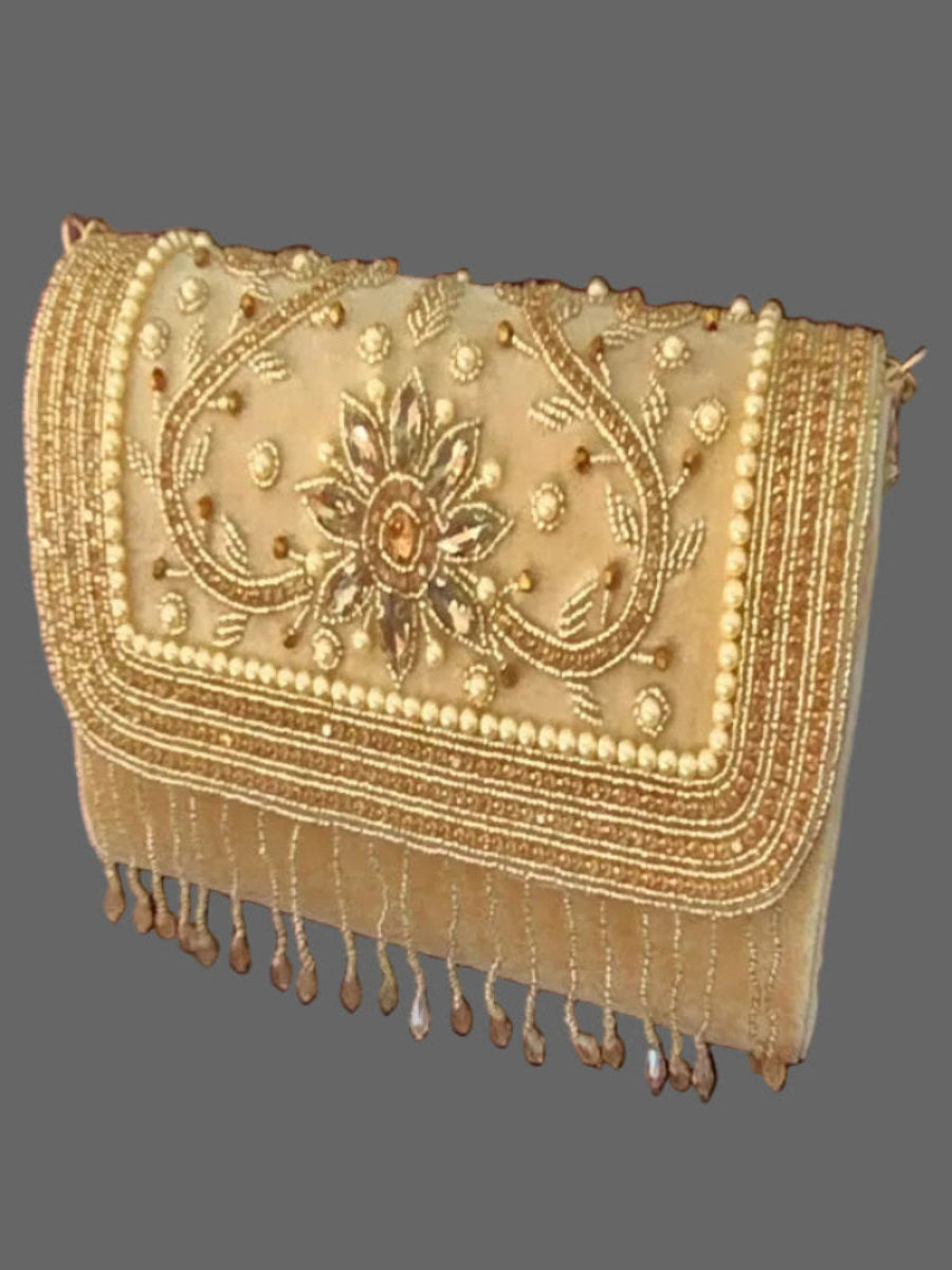 Gold tassel clutch bag