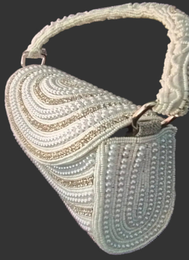 White pearl clutch bag