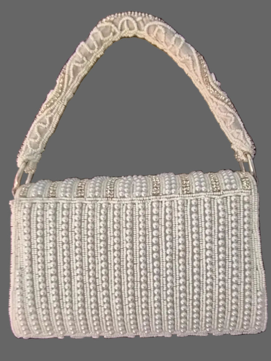 White pearl clutch bag