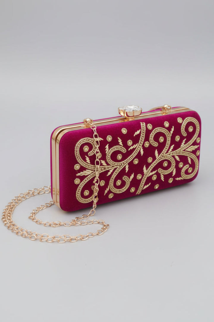 Plum evening clutch bag