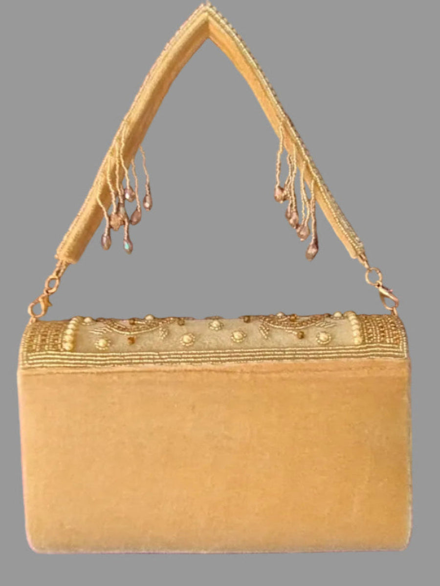 Gold tassel clutch bag