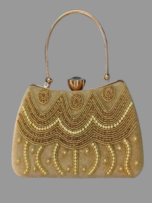 Gold beaded handbag with decorative patterns on a gray background