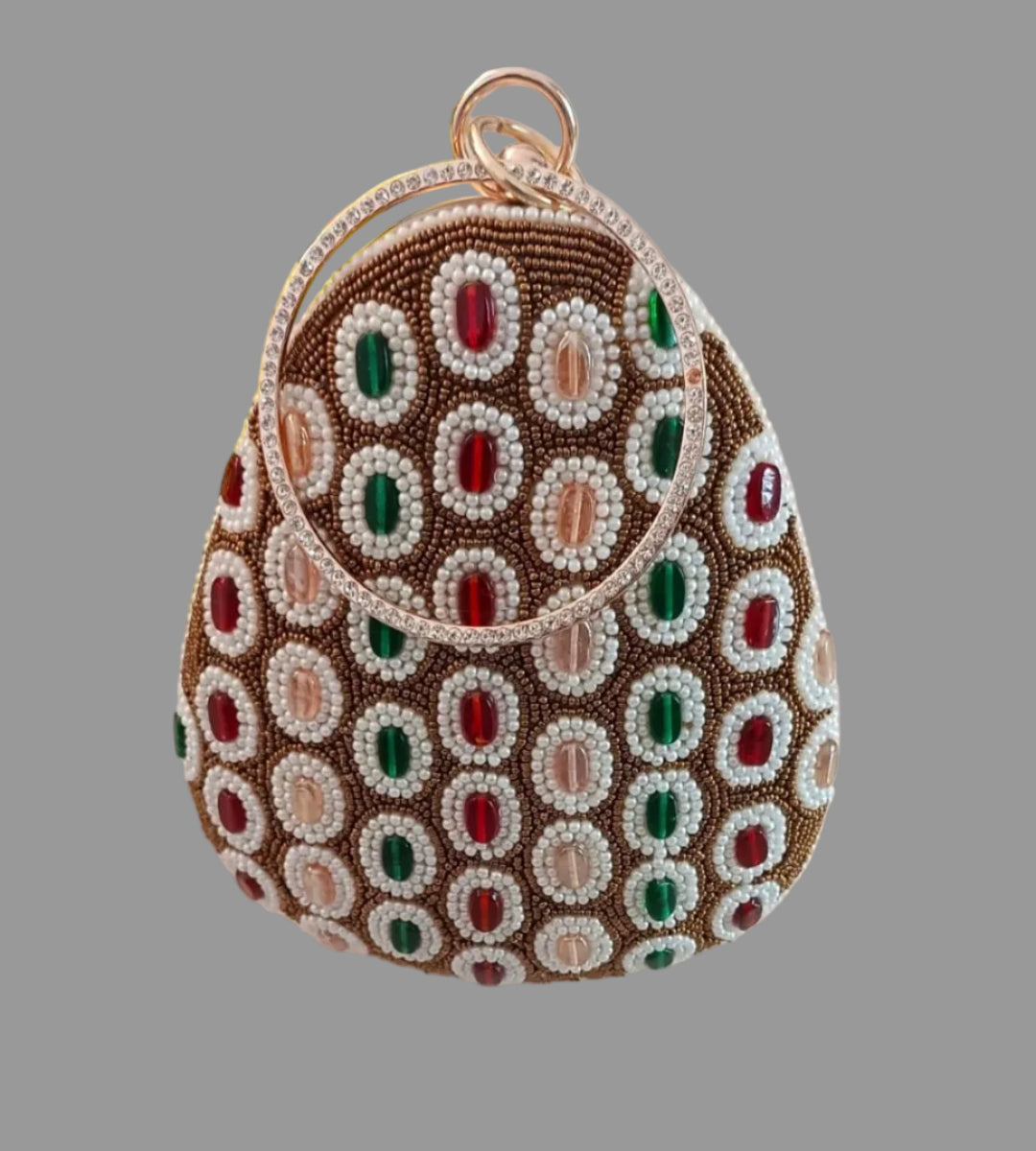 Beaded handbag with circular pattern on a light background