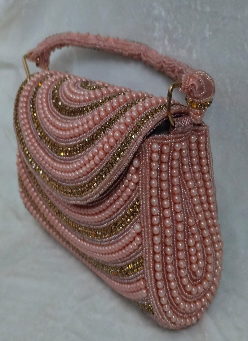 Peach pearl clutch bag